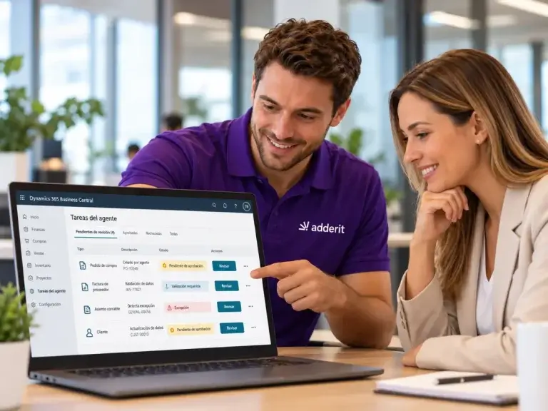 Consultor de Adderit supervisando tareas de agentes de IA en Microsoft Dynamics 365 Business Central junto a una cliente.